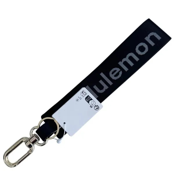 Lululemon Never Lost Keychain  Black/White/Gold - Image 8