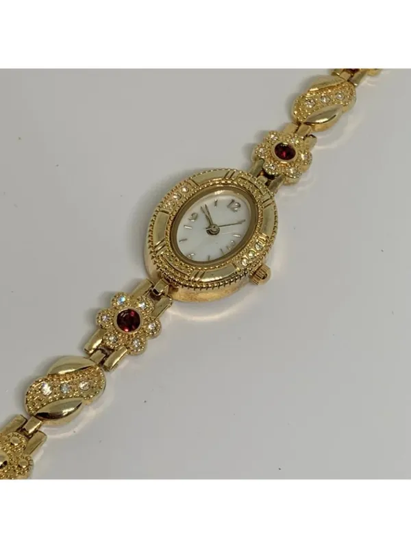 Allude gold tone women’s watch red stones 19mm floral links up to 7.5” running - Image 7