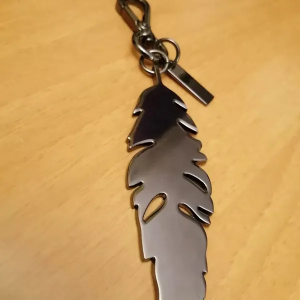 Jessica Simpson Pewter Solid Feather Color Keychain Bag Charm, Luggage Charm - Image 4