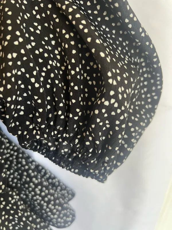 Luxxel Black and White Polka Dot Long-Sleeve Fit-and-Flare Romper - Image 9
