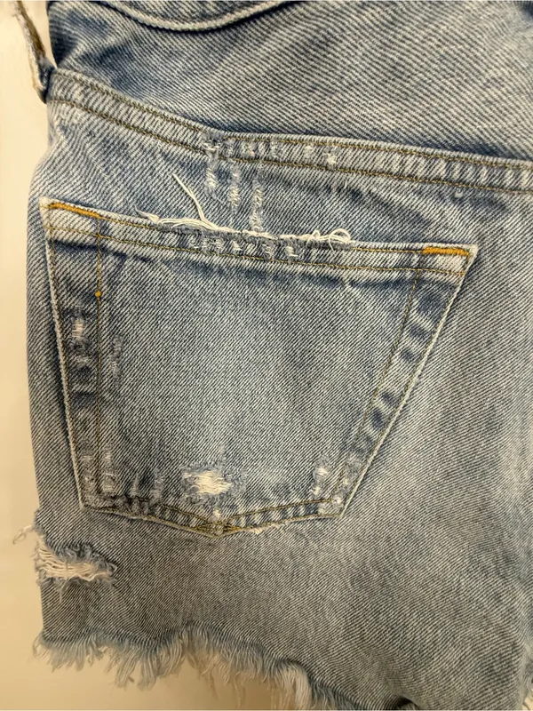 AGOLDE Light Wash Distressed Denim Cutoff Shorts - Image 8