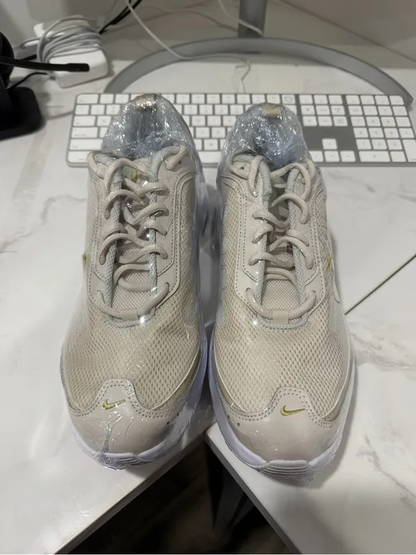 Nike Beige Athletic Sneakers with Gold Swoosh - Image 6