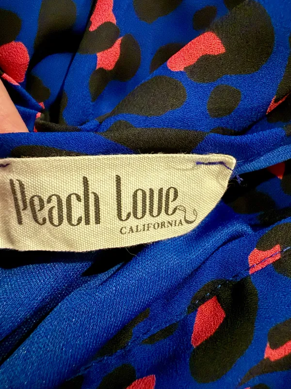 Peach Love California NWOT Cheetah print romper size medium - Image 4