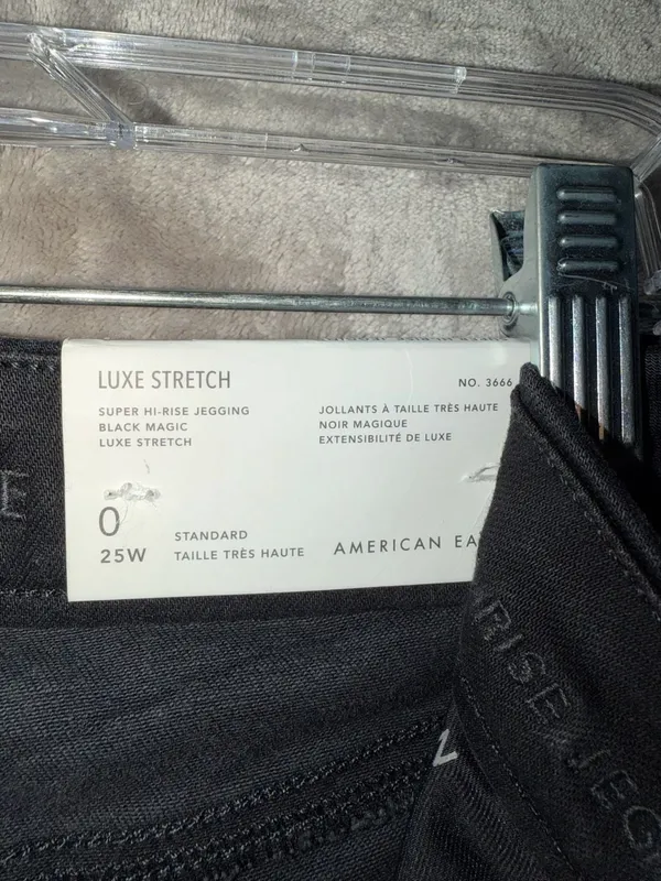 American Eagle Super Hi-Rise X4 Jegging Size 0 Black Ripped Jeans - Image 12