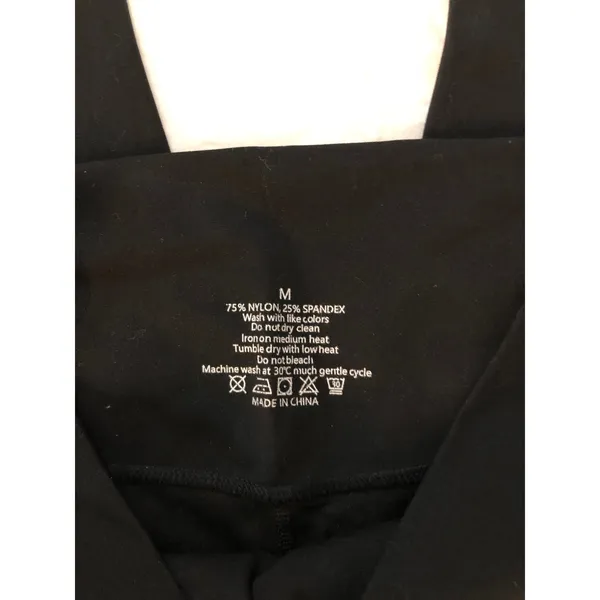Crossover waist black flare leggings Size M - Image 3