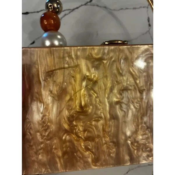 Lulu's Pearlescent Pink Acrylic Box Clutch with Gold Ring Handle - Image 5