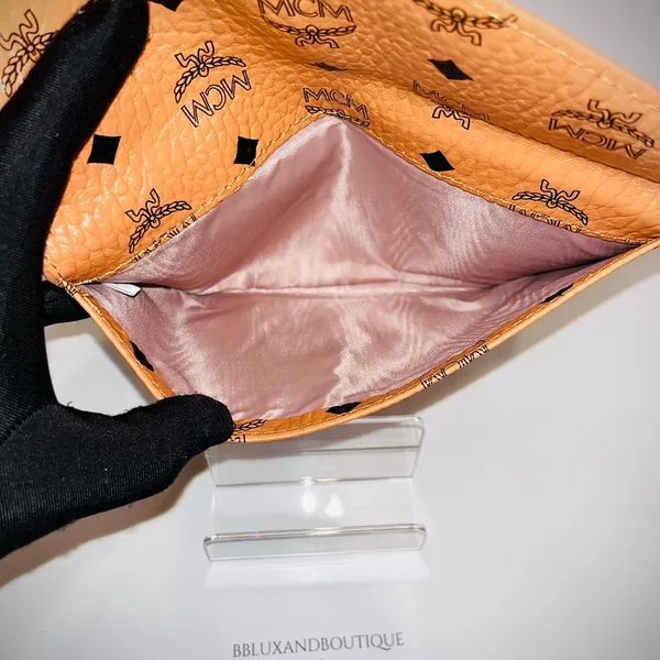 MCM Tangerine Logo Pattern Clutch - Image 4