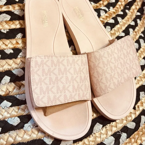Michael Kors MK Signature Logo Print Wade Slide sandals in pink - Image 9