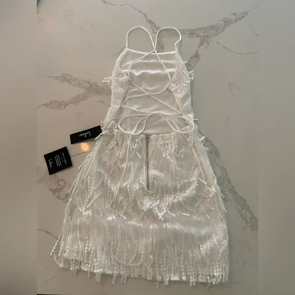 Lulu’s Making Magic White Fringe Lace-Up Mini Homecoming Dress - Image 3