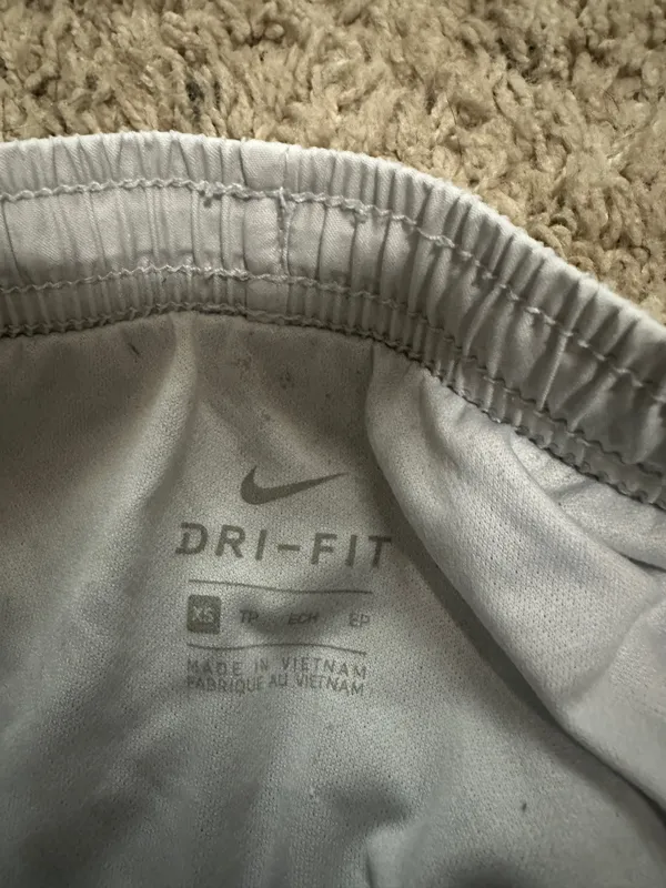White Nike Dri-Fit Running Shorts with navy and red detail - Image 3