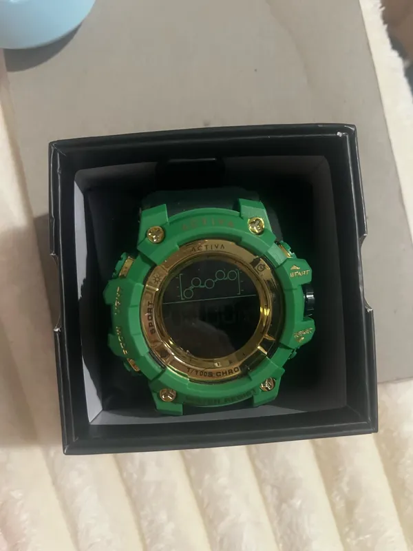 Men’s Activa by Invicta 50 mm watch, green bezel and black band NEW - Image 3