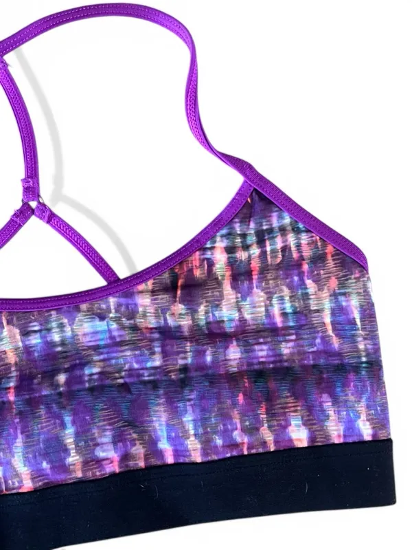 Alo Yoga racerback Spark sports bra featuring a purple abstract print - Image 5