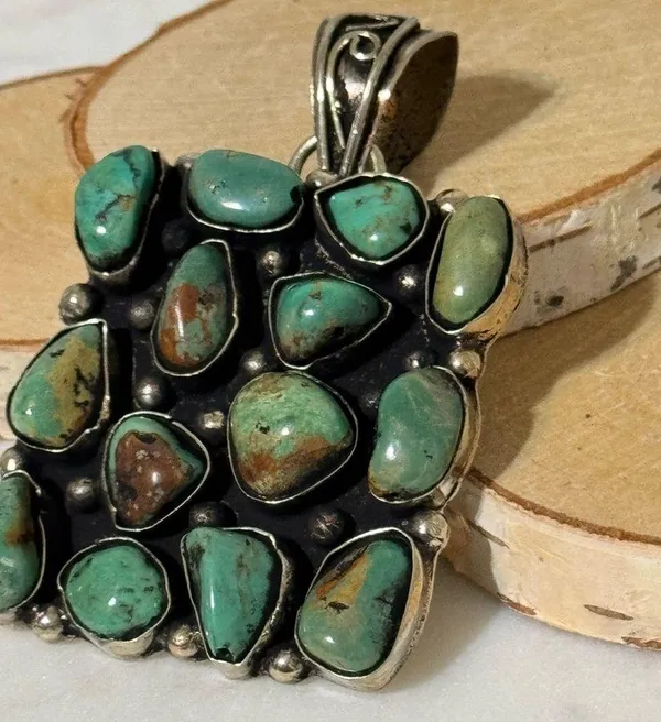 Turquoise cluster pendant set in Tibetan Silver. 14 nuggets, 2”x2” - Image 3
