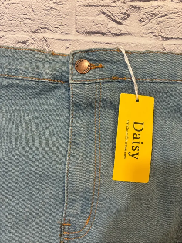 Daisy‎ Light Blue Denim Skirt with Yellow Brand Tag - Image 2