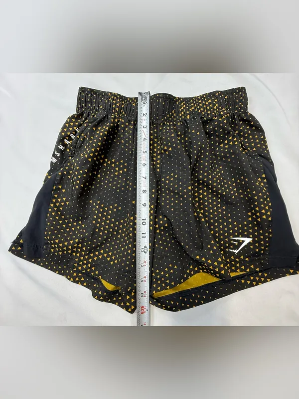 Gymshark Black Shorts with Gold Triangle Print - Image 5