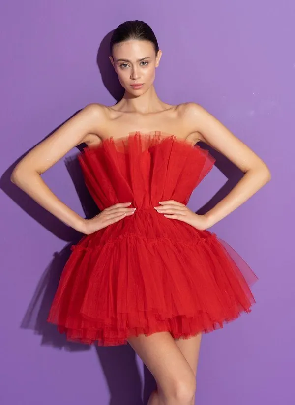 NWT Altar’d State Daria Tulle Red Mini Dress. Size Medium. We are obsessed with this romantic and feminine dress that will make you feel like a princess. This strapless dress features multiple layers of soft, tulle material that flow elegantly with every step you take. Whether you're attending a prom, formal, or any other special event, this dress is the perfect choice! Fit: Fitted at top, flowy at bottom Closure: Side zipper Material: Shell: 50% Nylon, 50% Polyester, Lining: 100% Polyester Sleeveless Imported - Image 9