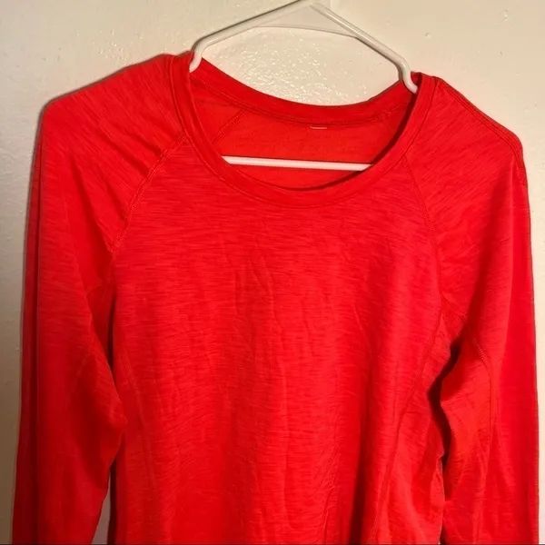Under Armour Women's Long Sleeve Athletic T-Shirt Bright Coral Pink Fleece Lined - Image 2