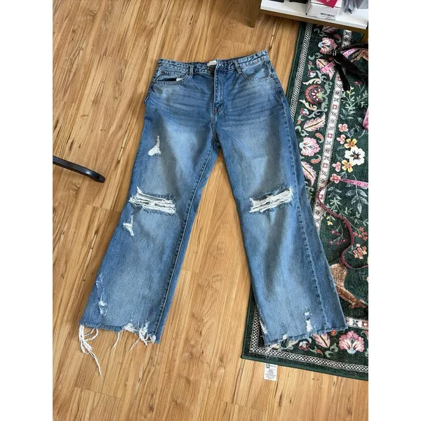 Petra 153 jeans w/ heavy knee destruction, whiskering, and a raw frayed hemline - Image 4