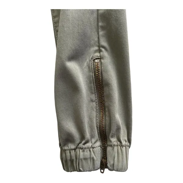 American Eagle -ARMY GREEN JOGGER PANTS-SIZE 2 Elastic waist with drawstring, zip front, two front and two back pockets, elastic ankles with a side zipper, excellent condition Measurements: Waist: side to side 13-16 inches Rise: 9 inches Inseam: 37 inches - Image 4