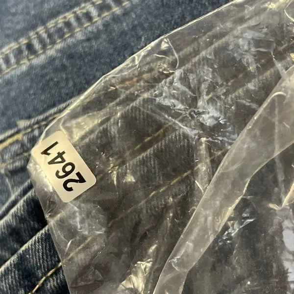 Levi’s woman’s size 30W 32” inseam relaxed fit boot cut jeans - Image 7