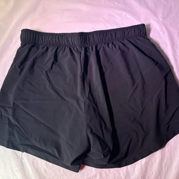 Nike Black Shorts with Neon Yellow Interior - Image 3