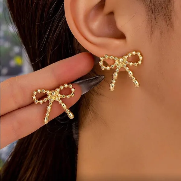 Chic Gold Bow Earrings - Image 2