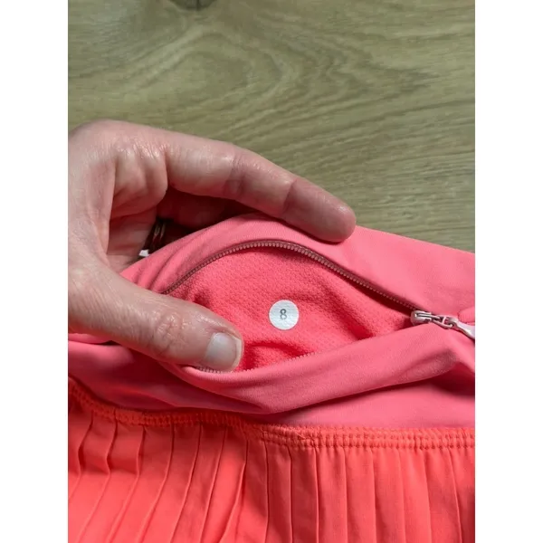 EUC Women Lululemon Pleat To Street Skirt II Grapefruit neon tennis skirt Size 8 - Image 3