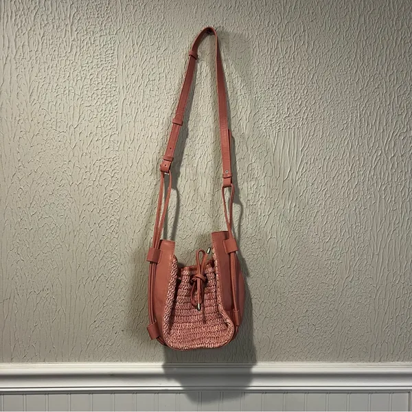 Free People Cabana Woven Drawstring Crossbody Bag in Pink - Image 4