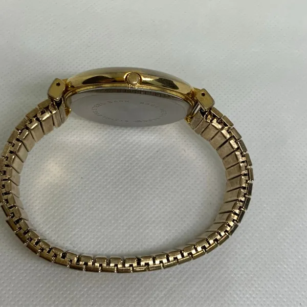 Vintage Unitron women’s watch gold tone quartz analog 40mm mop dial running - Image 7