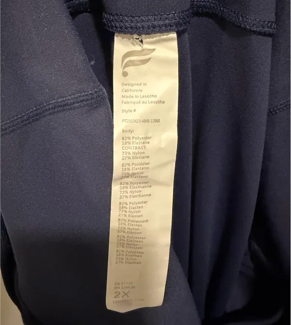 Fabletics Oasis PureLuxe High-Waisted Crossover Flare Leggings Navy - Image 9