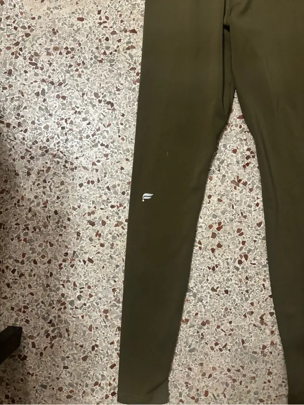Fabletics Motion 365 onesie in olive green features a racerback design - Image 8