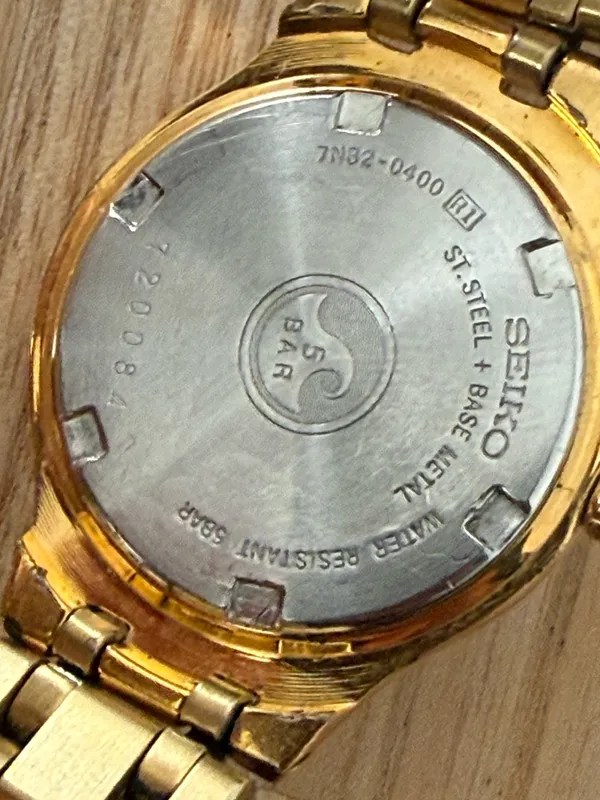 Seiko Vintage Watch Gold Bracelet Case White Dial Blue Gold Hands Date Window - Image 10