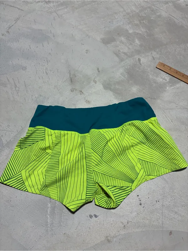 Brooks Neon Lime Running Shorts with Teal Waistband - Image 5
