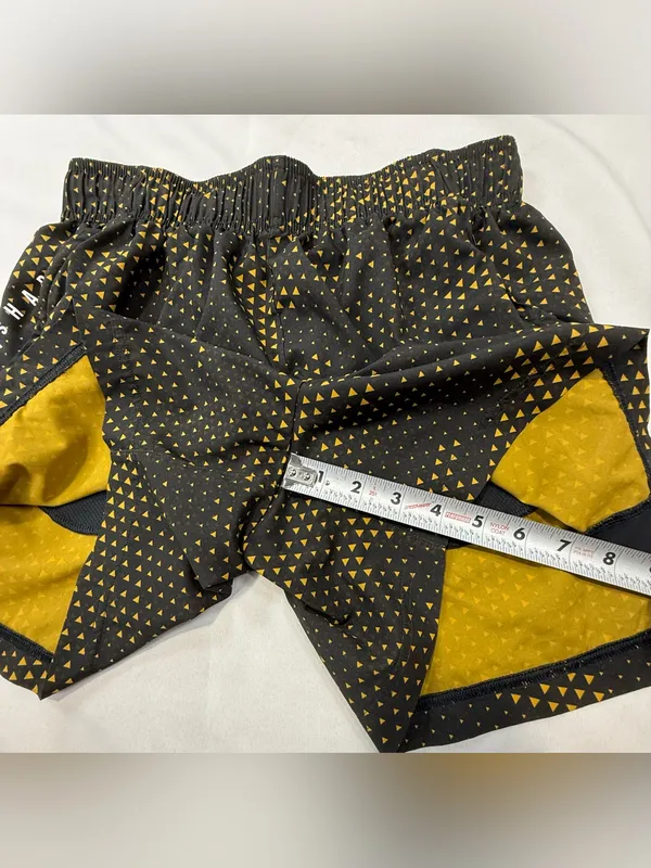 Gymshark Black Shorts with Gold Triangle Print - Image 7