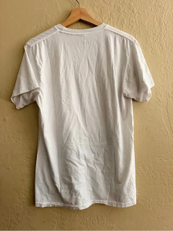 White Graphic Short Sleeve Tee with Yellow and Blue Costume Print - Image 2