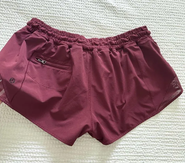  Lululemon maroon lined drawstring shorts with reflective striped sides   - Image 5