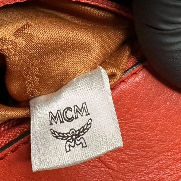MCM Orange and Tan Monogram Satchel - Image 12