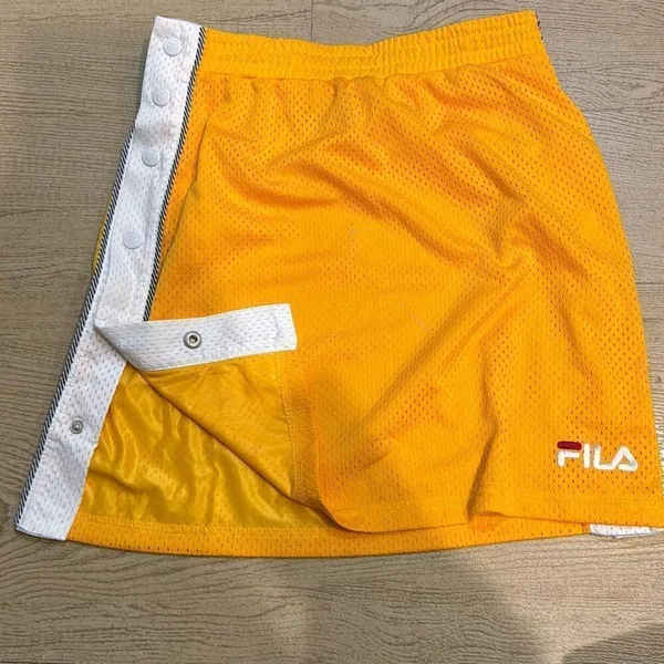 NWOT fila women’s yellow‎ snap off skirt size Xs - Image 2