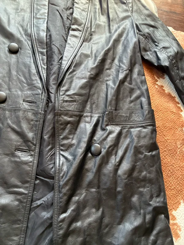 Vintage Black leather Rock Creek trench coat size small The outer shell is 100% genuine leather The lining in Nylon! Missing 1 button on the right side in pictures 1-4 not noticeable or even a snag there!!! - Image 3