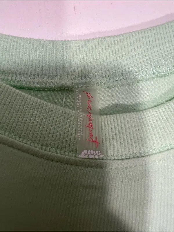 NWT FP Movement Pistachio green hot shot crossover top size L - Image 9