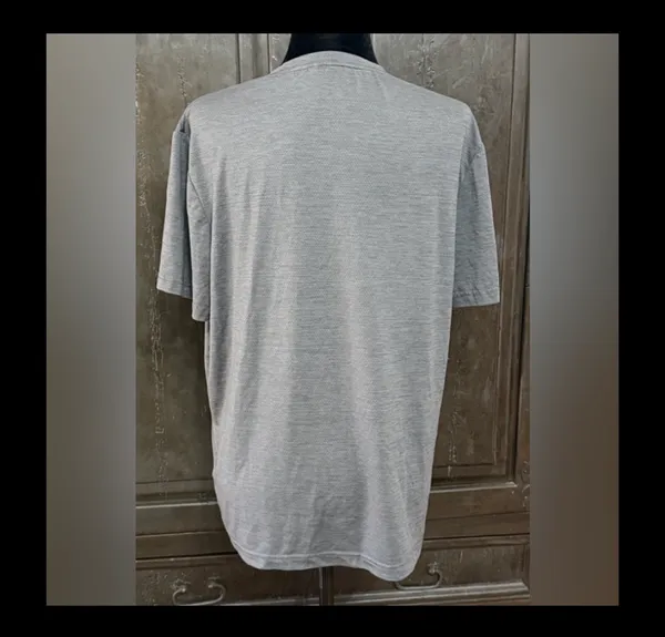 QuikSilver Gray /Charcoal T-shirt - size Large. Gently Warn & in excellent condition. Innovate your future printed on back tail. True color is the ones with measurements. Measurements approximately 22” from armpit to armpit x 26” long. Non-smoking home. priced to sell at as is condition. Don’t like my price, make reasonable offer! And thank you for checking my closet. - Image 2