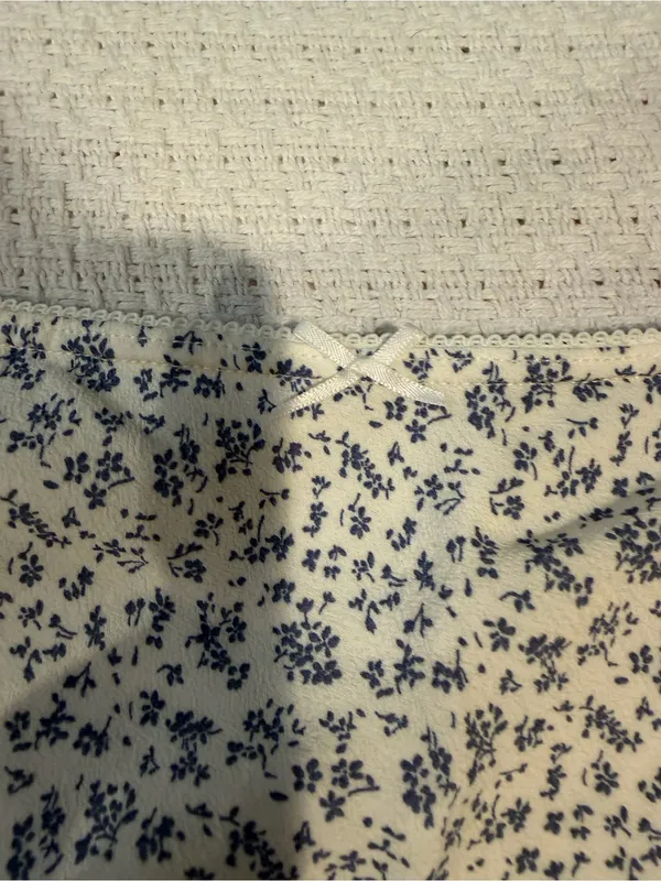 Brandy Melville Cream Skirt with Blue Floral Print - Image 4