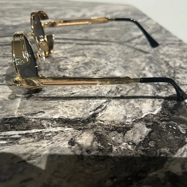 Round Gold and Black Sunglasses - Image 4
