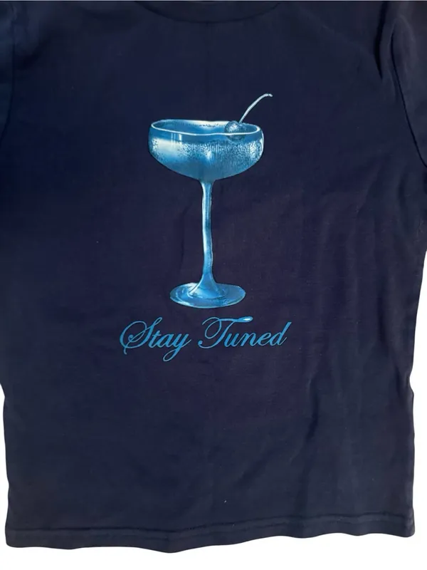 Edikted Navy Blue Cotton Cropped Tee with Shimmering Blue Cocktail Graphic - Image 2