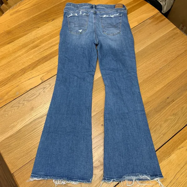 American Eagle Super Hi-Rise Flare Jeans Blue Distressed Raw Hem Women 10‎ Reg - Image 5