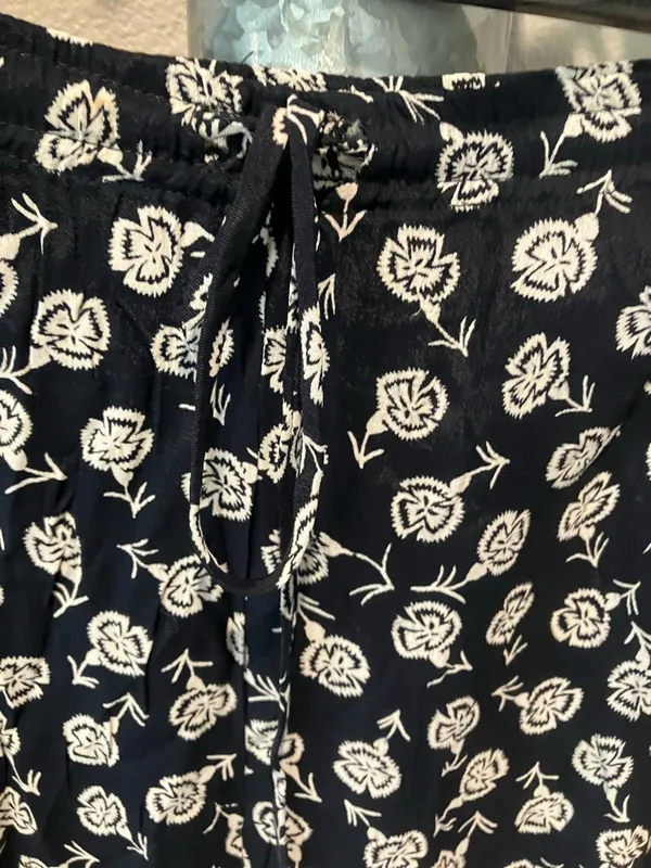 Nostalgia Black and White Floral Flare Pants tied waistband pockets - Image 4