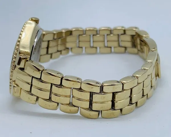 Armitron 27mm ladies Quartz analog WR watch gold tone MOP dial 6.5”-7” - Image 3