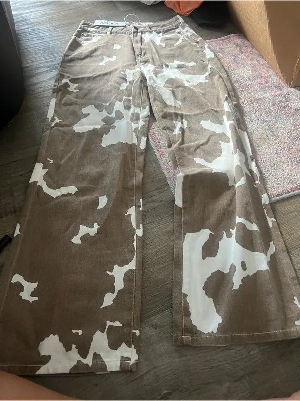 NWT 12th Tribe cow print jeans size small - Image 12