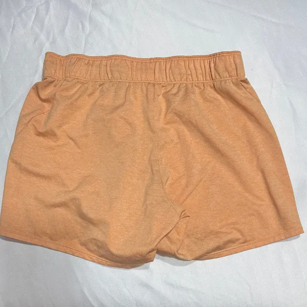 Nike Women's Light Peach Athletic Shorts with Reflective Swoosh - Image 5