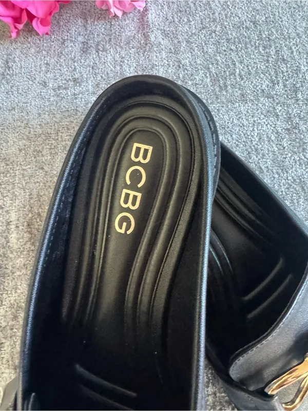 BCBG Black Leather Mules with Gold Knot Detail - Image 6